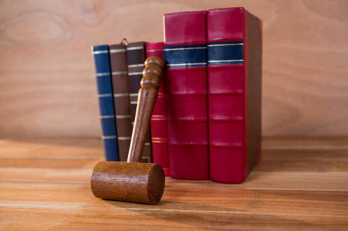 Judges gavel with books